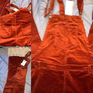 Brand new overalls with added lace
